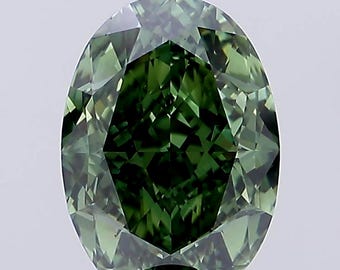 May include: An oval-shaped, faceted gemstone in a deep green shade. The facets of the gem reflect light, producing a sparkling appearance. The stone's colour varies from light to dark green, with a darker green core.