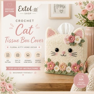 Può includere: Una copertura per scatola di fazzoletti all'uncinetto color crema a forma di gatto, con decorazioni floreali rosa e bianche, baffi ricamati neri e due orecchie a punta. La base è decorata con fiori e foglie verdi realizzati all'uncinetto.
