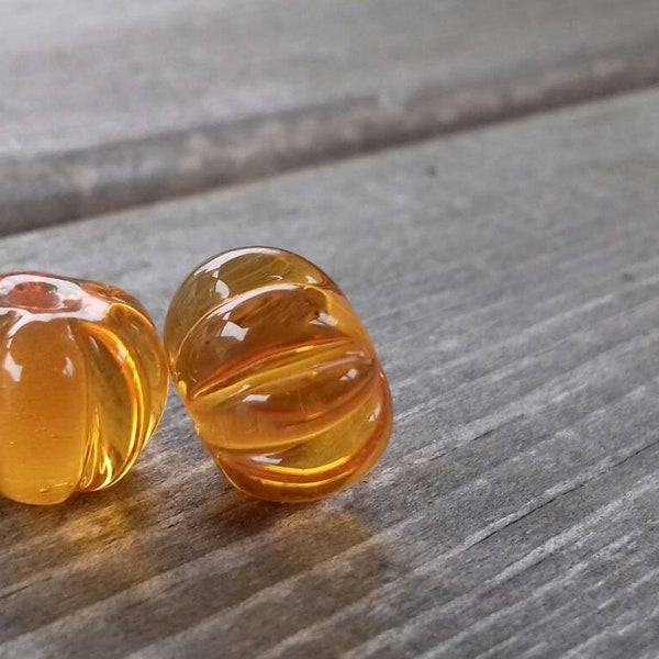 Transparent amber pumpkin shaped bead pair - lampwork glass beads - UKhandmade