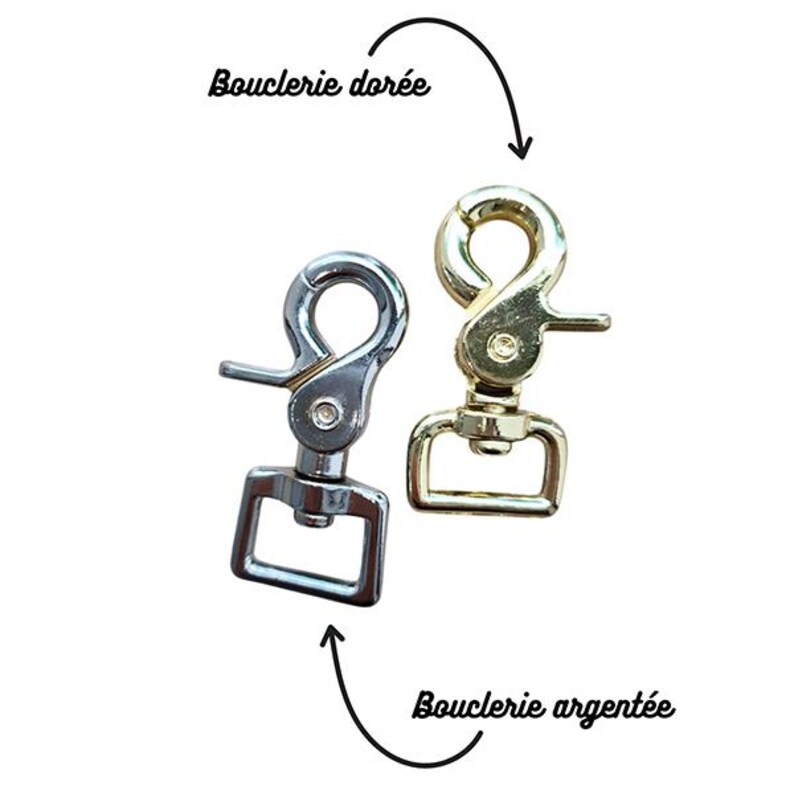 K&ouml;nnte beinhalten: Zwei Metall-Karabinerhaken, einer silberfarben und einer goldfarben, vor wei&szlig;em Hintergrund. Der goldfarbene Haken ist mit "Bouclerie dor&eacute;e" und der silberfarbene Haken mit "Bouclerie argent&eacute;e" beschriftet.