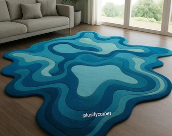 Tappeto in lana trapuntato a mano / Tappeto astratto blu con motivo onde oceaniche