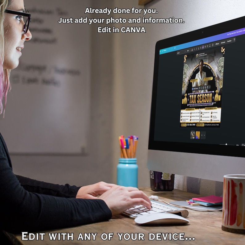 May include: A person using a computer with a screen displaying a "Tax Season" flyer. The flyer features a woman, money graphics, and text. The computer is on a wooden desk with a keyboard, mouse, and a mug. Text on the screen says "Edit in CANVA".