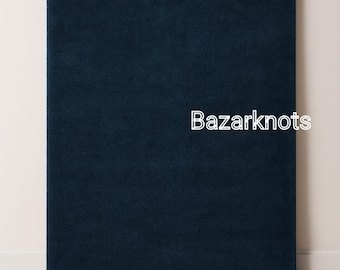 May include: A navy blue rug with a soft, textured surface. The rug is rectangular and has a folded section that stands upright against a wall. The text "Bazarknots" is visible on the rug.