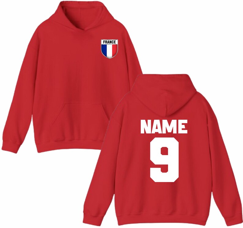 May include: A red hoodie with a front pocket and a hood. The front features a small shield with the word "FRANCE" and the French flag colors. The back displays the word "NAME" above the number "9" in white.
