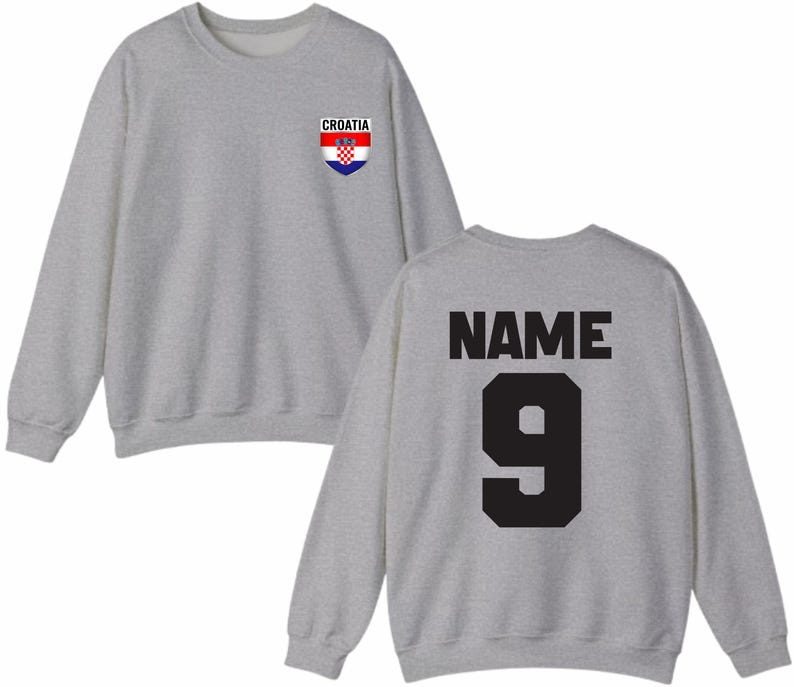 May include: A heather gray sweatshirt with the word "CROATIA" above a Croatian flag emblem on the front. The back of the sweatshirt displays the word "NAME" above the number "9" in black.