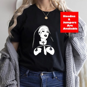 Gothic Nun Graphic T-Shirt , Unholy Religious shirt, Sassy Nun Religious tshirt, Nun with Cross Hands tee,  Unisex Horror tee for friends