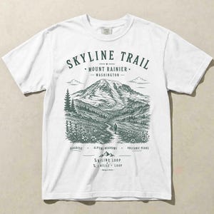 White Comfort Colors shirt featuring a vintage Skyline Trail hiking design.