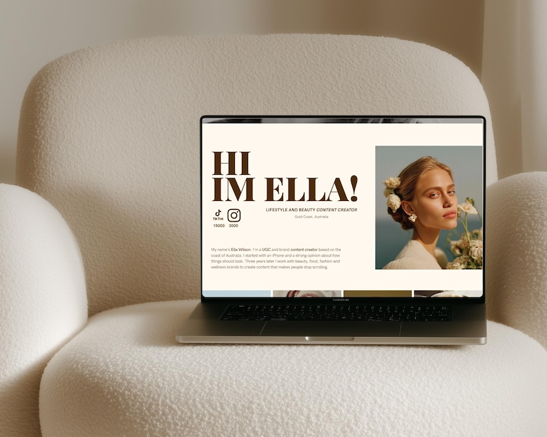May include: A laptop screen displaying a website with the text HI IM ELLA! LIFESTYLE AND BEAUTY CONTENT CREATOR. The page features a portrait of a person with flowers in their hair, social media icons, and a short biography about a content creator.