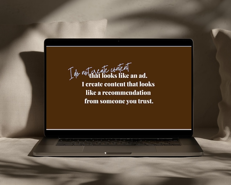 May include: A laptop screen displaying a dark brown background with white text that reads: I do not create content that looks like an ad. I create content that looks like a recommendation from someone you trust. The laptop has a black frame.