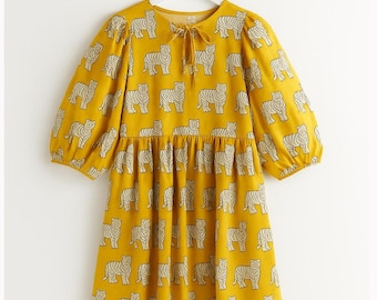 Midikleid aus Baumwolle mit Blockprint: Sommerkleid mit tiefem Halsausschnitt und Animal Print