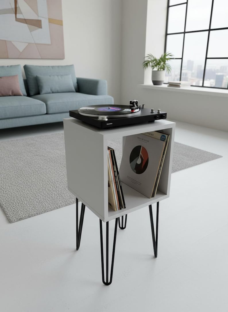 Modern record player stand with spacious vinyl storage below and a sturdy top surface for a turntable. Minimalist design made from solid wood, ideal for living room or music corner organization.