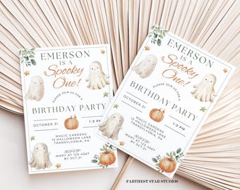 May include: Two white and orange Halloween-themed birthday party invitations with a ghost and pumpkin design. The invitations say "Emerson is a Spooky One!" and include the date, time, and location of the party. RSVP information is also included.