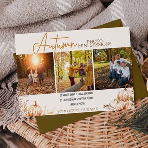 May include: A postcard advertising autumn family photo mini sessions. The postcard features three photos of families in a park setting with autumn foliage. The text on the postcard reads "Autumn Photo Mini Sessions", "30 Minute Shoot/Local Location", "25 High Res Images/Up to 4 People", "1 Printed Photo", and "Your Studio's Name".