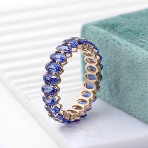 Dainty Blue Sapphire Eternity Ring: Sterling Silver September Birthstone