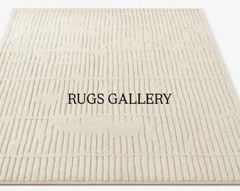 Alfombra de color marfil con mechones hechos a mano, con textura lineal, moderna y minimalista, ideal para sala de estar y dormitorio.