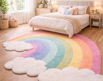 May include: A large, semi-circular area rug featuring a vibrant rainbow pattern with concentric bands of pink, orange, yellow, green, blue, and purple. The rug includes three distinct, plush white cloud-shaped sections attached to the edges.