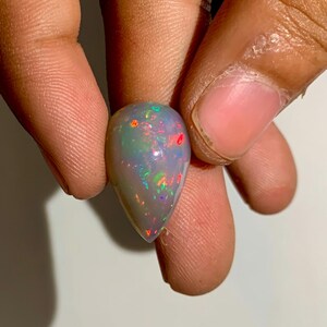 9.70 CT Natural Ethiopian Opal Pear Cabochon: Multi-Fire Gemstone