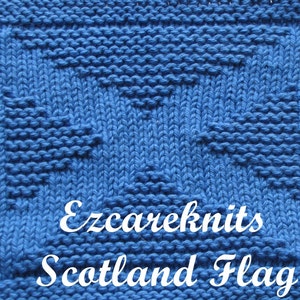 Könnte beinhalten: Ein blauer Strick-Topflappen mit einem weißen Kreuzmuster, das die Flagge Schottlands darstellt. Der Text "Ezcareknits Scotland Flag" ist in der unteren rechten Ecke sichtbar.