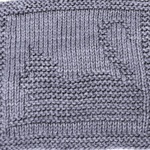 May include: A gray knitted dishcloth with a geometric pattern.