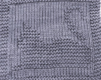 May include: A gray knitted dishcloth with a geometric pattern.