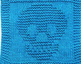 Könnte beinhalten: Ein blauer Strick-Geschirrtuch mit geometrischem Muster. Der Geschirrtuch ist aus Baumwollgarn gefertigt und soll saugfähig und strapazierfähig sein.