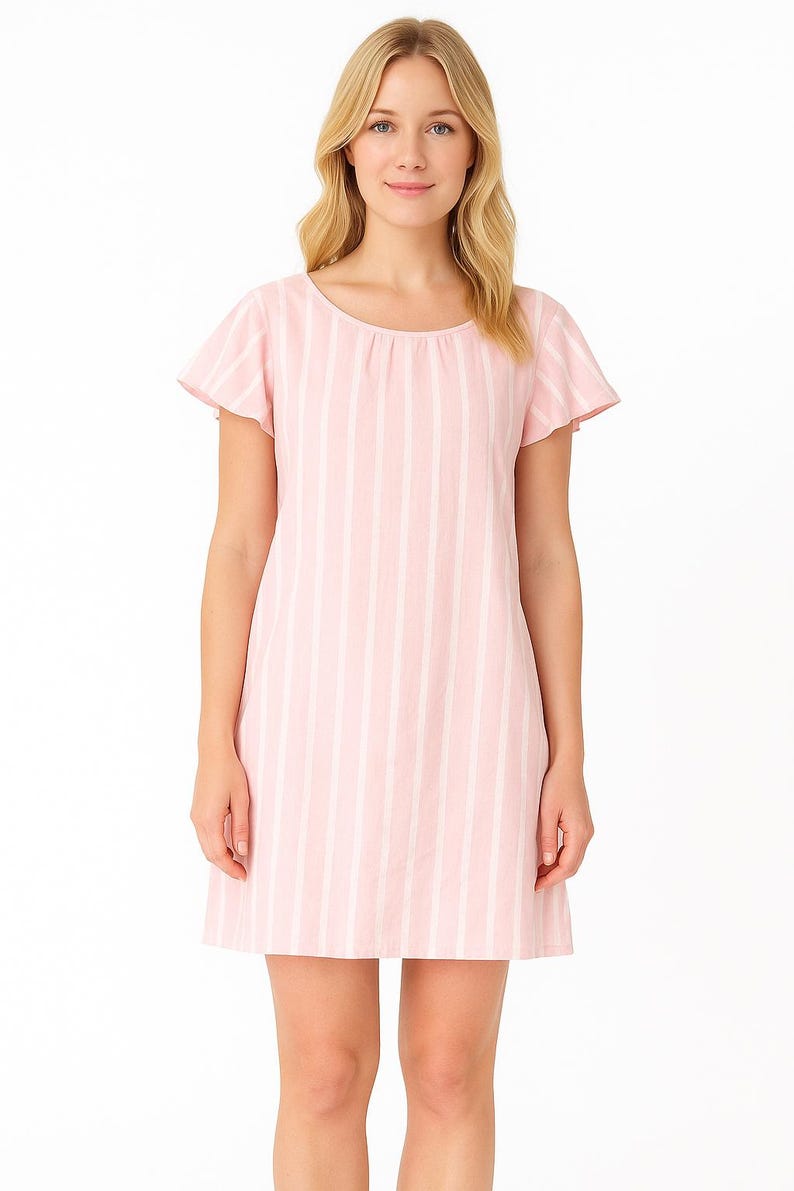 May include: A pink and white striped dress with short, flutter sleeves. The dress has a scoop neckline and a straight, relaxed fit. The fabric appears to be lightweight, suitable for warm weather. The dress is knee-length.