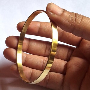 Pulsera rígida chapada en oro: Pulsera rígida apilable y delicada, joyería artesanal de la India.