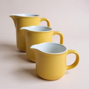 Three Arabia Finland Pitchers