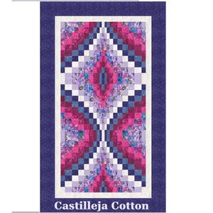 May include: A rectangular quilt with a floral pattern in shades of pink, purple, and blue, framed by a dark blue border. The quilt features a central diamond design and the text "Castilleja Cotton" at the bottom.