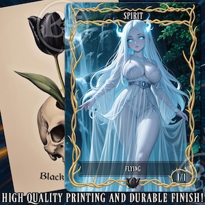 May include: A fantasy art card depicting a spirit with long white hair and a flowing white dress. The card has a gold border and the word "SPIRIT" at the top. The card also features the text "FLYING" and "1/1". A second card shows a black tulip and a skull.