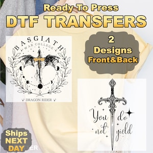 May include: A light yellow t-shirt with two DTF transfer designs. One design features a dragon with the text "BASGIATH WAR COLLEGE" and "DRAGON RIDER". The other design is a sword with the text "You do not yield".