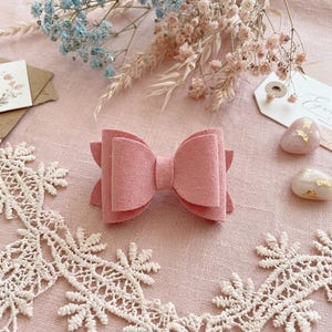 Pink suede dog bow