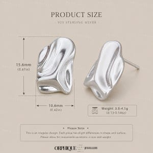 May include: A pair of sterling silver stud earrings with an abstract, organic design. Each earring is approximately 0.61 inches (15.6mm) in height and 0.42 inches (10.6mm) wide. The weight of each earring is between 0.13-0.14 ounces (3.8-4.1g).