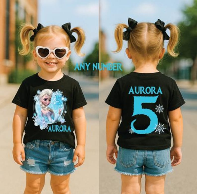Pu&ograve; includere: T-shirt nero con grafica di una principessa dei cartoni animati e il numero 5 in blu. La parte anteriore della maglietta dice "Aurora" e il retro "Aurora 5". La maglietta &egrave; indossata da una bambina con le trecce e gli occhiali da sole.