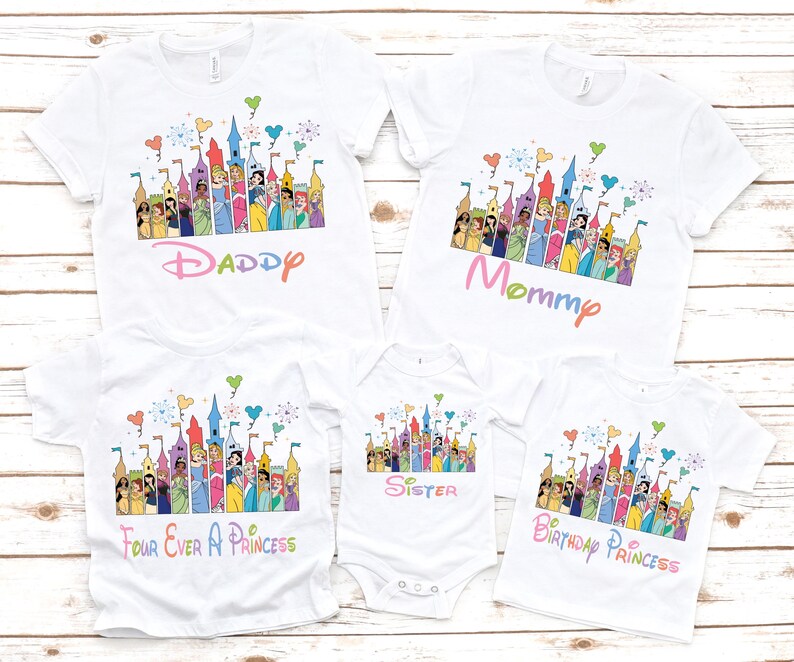 May include: White t-shirts with a colorful castle graphic and princess characters. The shirts have text that says "Daddy", "Mommy", "Four Ever A Princess", "Sister", and "Birthday Princess".