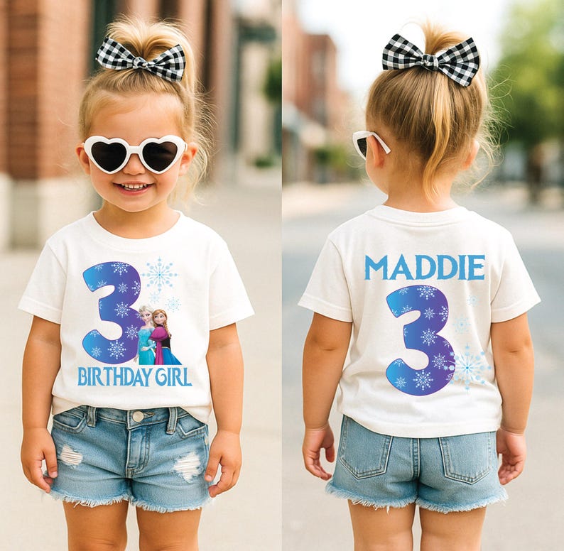 K&ouml;nnte beinhalten: Ein Kind tr&auml;gt ein wei&szlig;es T-Shirt mit einer blauen Zahl 3 und den Worten "Birthday Girl". Das T-Shirt hat eine Cartoon-Grafik. Das Kind tr&auml;gt Jeansshorts und herzf&ouml;rmige Sonnenbrillen. Auf der R&uuml;ckseite des Shirts steht der Name "MADDIE" und die Zahl 3.
