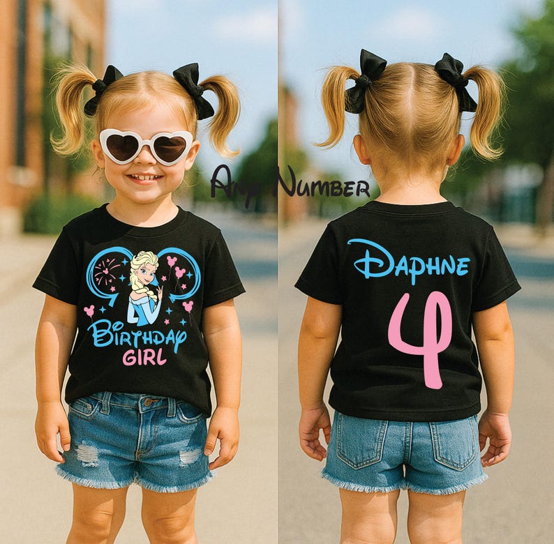 May include: A black short-sleeved t-shirt featuring a graphic of a blonde character in a blue dress with the text Birthday Girl on the front and the name Daphne with the number 4 in pink on the back, paired with blue denim shorts.
