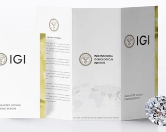 May include: A faceted diamond next to a white IGI Laboratory Grown Diamond Report. The report is tri-fold with the IGI logo and text. The diamond is round and clear, reflecting light.