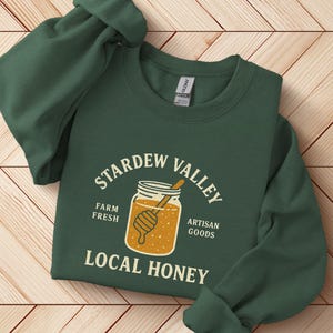 Stardew Valley スウェットシャツ、Local Honey Stardew グッズ、ゲーマーギフト Pelican Town クルーネック