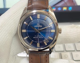 Reloj mecánico vintage Roamer: esfera azul, correa de piel marrón