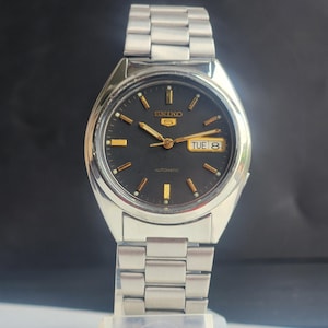 SEIKOセイコー 型番7S26-3040自動巻き Seiko Seiko 5 7S26-3040 Day Date St.Steel Silver Round
