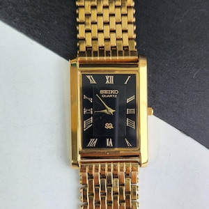 SEIKO 真鍮・ガラス目覚時計　ビンテージ Black Face 正確に稼働 Vintage SEIKO Quartz Japan Movement 2 Tone Gold and Silver