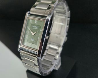 Reloj Seiko Slim Quartz vintage restaurado, esfera verde, brazalete plateado: estilo rectangular vintage de vestir