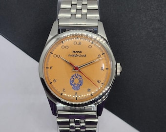Vintage HMT Janata Kannada Uhr: Orangenes Gesicht, Handaufzug, Ausstellungsrückseite