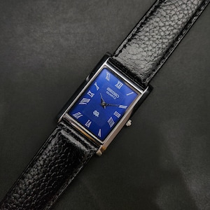 Vintage Refurbished Seiko Slim Quartz Blue Face Black Band 26mm Rectangular Men's Watch