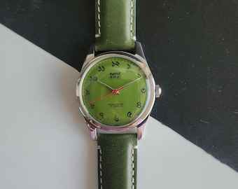 Reloj de pulsera vintage HMT Janata Bangla de cuerda manual, esfera verde, 17 joyas, 35 mm, fondo transparente, correa de cuero verde, para caballero.