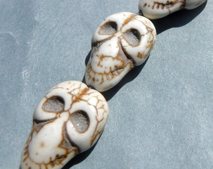 Skull Beads - Approximately 19 Stone Beads - 21mmx 15mm