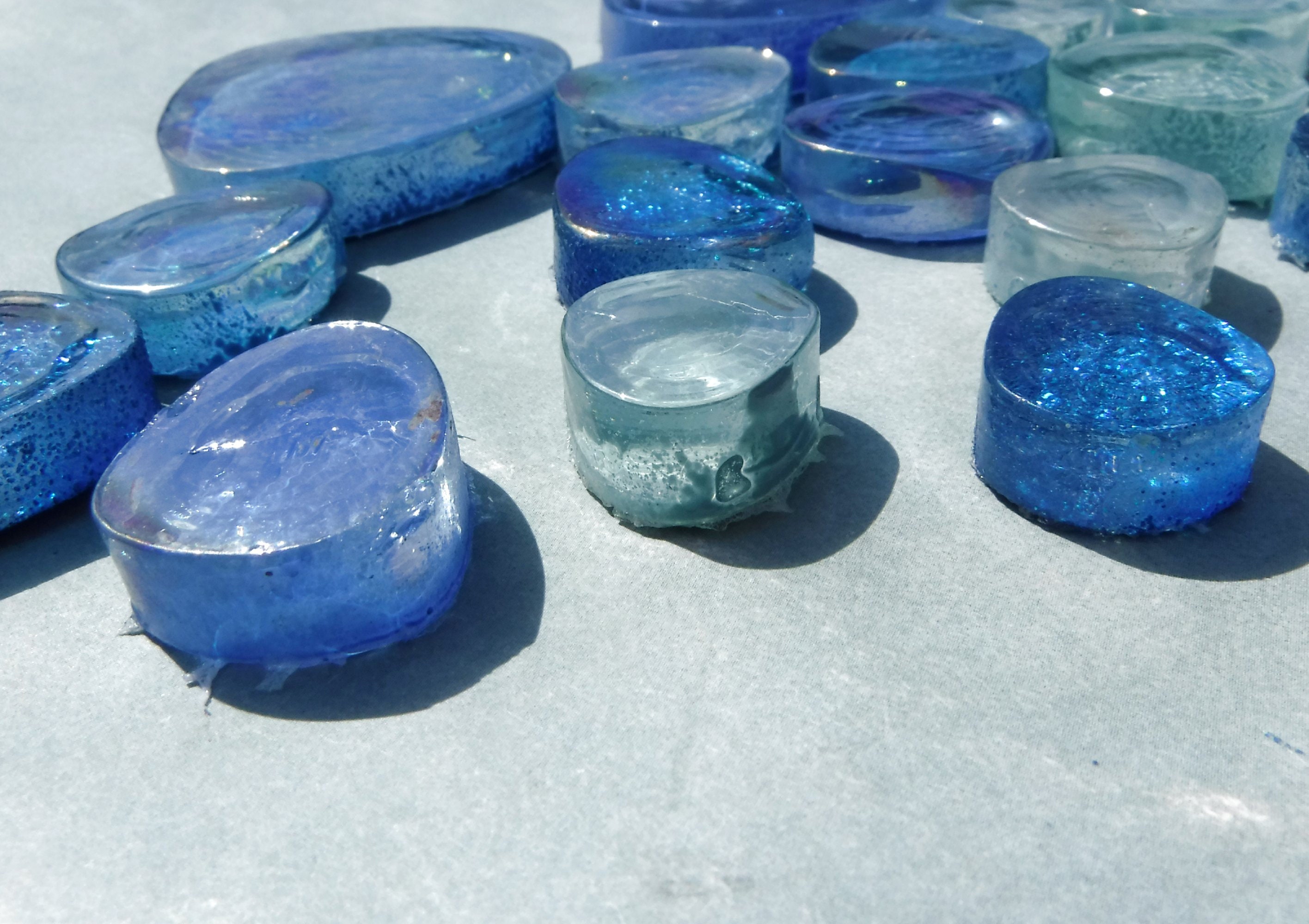 Light And Dark Blue Iridescent Glass Pebble Tiles Some Glitter Half