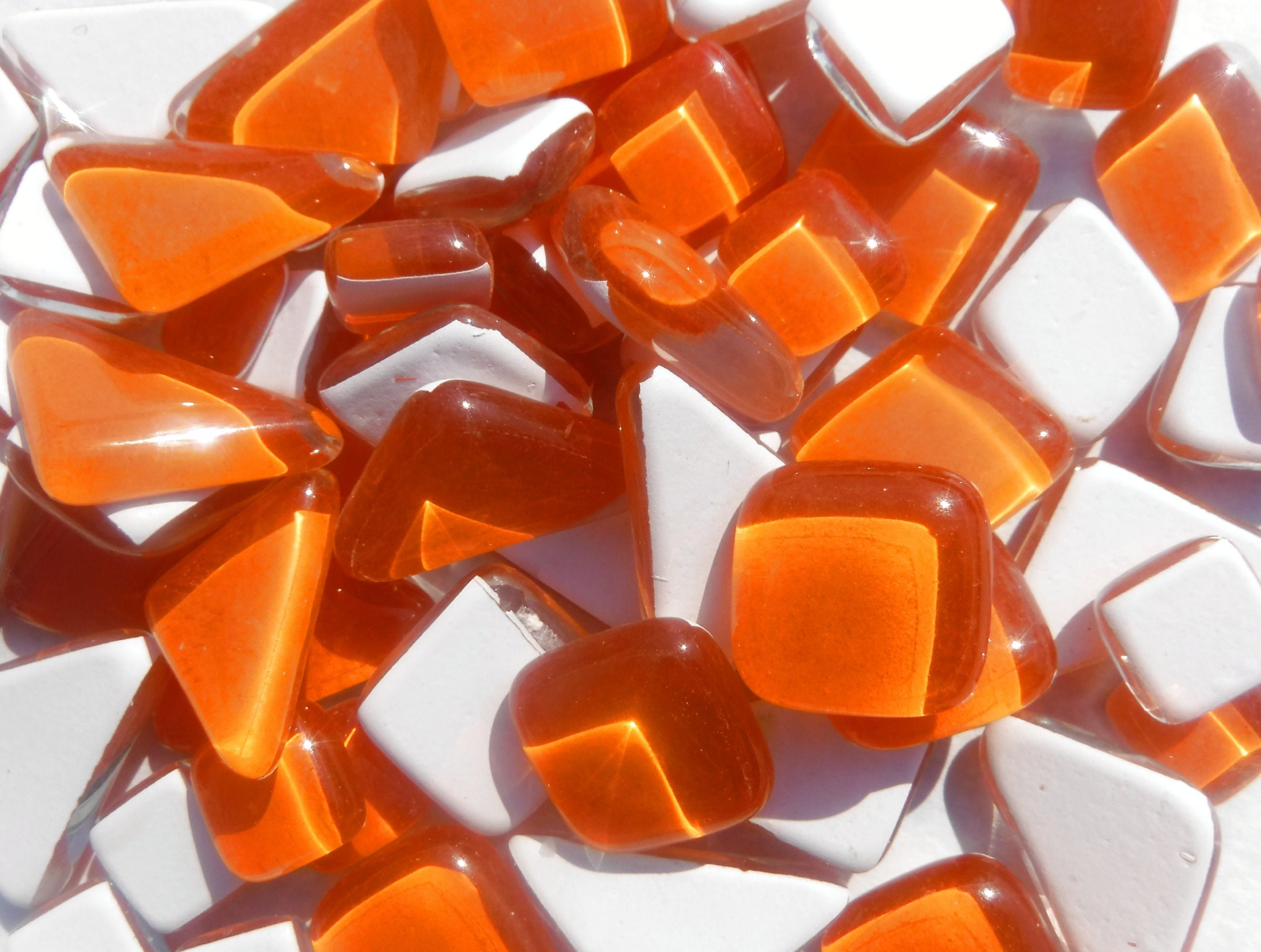 Orange Glass Puzzle Tiles Assorted Shapes 100 grams
