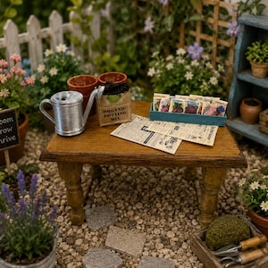 May include: A miniature garden scene featuring a wooden table with a silver watering can, a bag labeled Organic Potting Mix, a blue tray of seed packets, and newspaper clippings. Surrounding items include potted flowers, a sign reading Bloom Grow Thrive, and a wooden shelf with small plants and a birdhouse.
